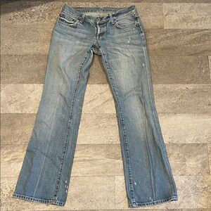 Women’s low rise boot cut light denim jeans